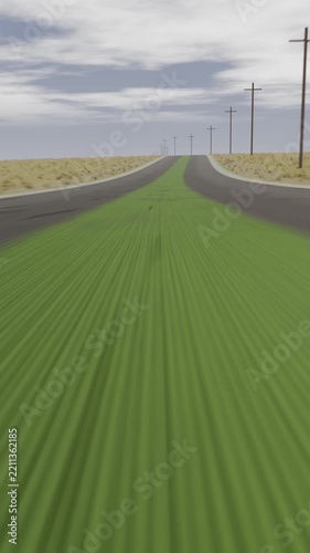 Vertical video: Starting forward movement green strip moving between lanes rural road poles fading