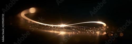 Glowing light trail forming elegant curve on black. Golden light streak with sparkling particles creating a dynamic, flowing curve on a dark background