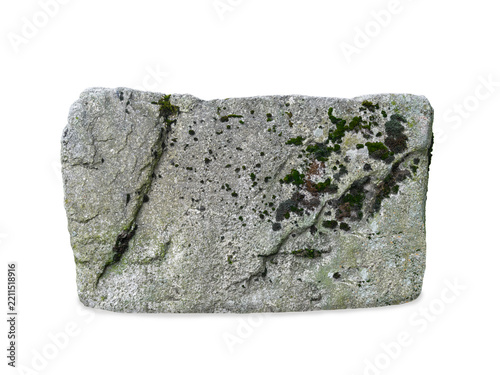 Granite stone block covered with moss isolated on white background.