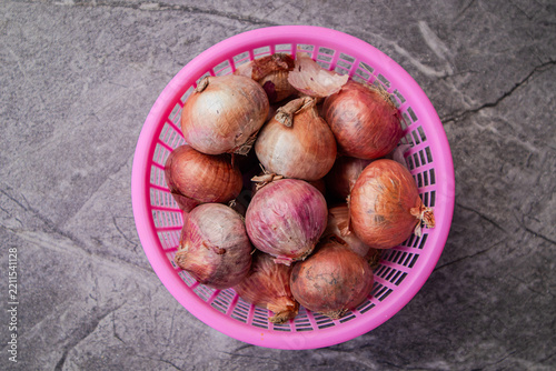 Fresh onions in a basket