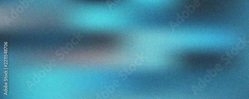 Vibrant turquoise and blue gradient blur with heavy grainy noise texture for artistic digital design layouts