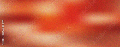 Vibrant warm sunset gradient texture with grainy cinematic film aesthetic and rich glowing orange red tones