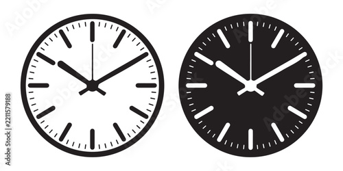Professional analog wall clock faces with minute markers and sleek hands for scheduling and time management.