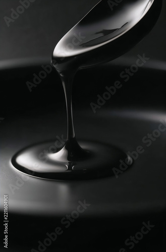 Thick black liquid Minimalist abstract dark background