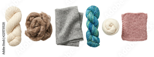 Assortment of natural wool products for knitting and felting, showing raw fiber, chunky yarn, a variegated skein, roving, felt fabric, and a pink knitted swatch