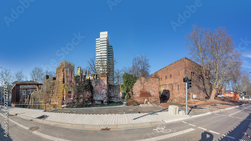 historic ruins of the Kaiserpfalz - Imperial Palace - in Kaiserslautern and modern skyscraper town hall and castle.