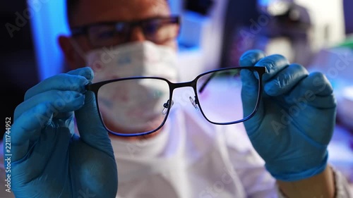  Medical optics specialist prepares eyewear vision correction
