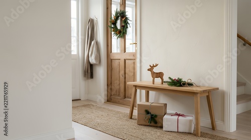 リースとプレゼントを飾ったミニマルなクリスマス玄関