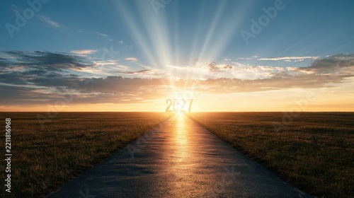 Road to 2027 at Sunset with Glowing Sun Rays and Fields, Emphasizing New Beginnings and the Future Journey