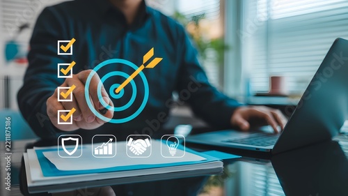 Professional Business Expert Analyzing Strategic Goals and Performance Metrics on Digital Interface
