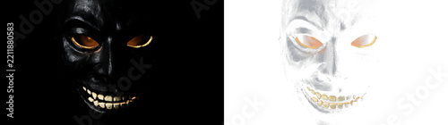 Spooky black evil monster mask with glowing eyes and creepy grin for Halloween designs, PNG , isolated on transparent background