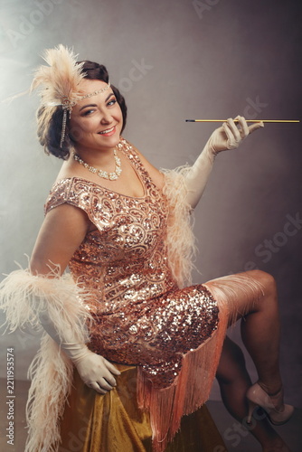 1920s Flapper Woman with Cigarette Holder in Sequin Dress - Great Gatsby Style