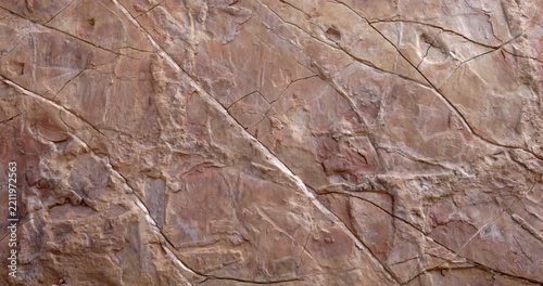 Slow Motion Slider Across Weathered Rock Texture With Cracks and Natural Mineral Veins
