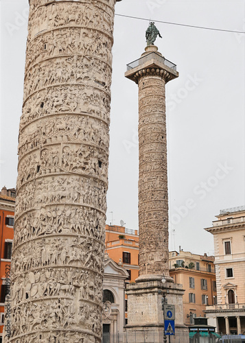Battle Scenes of Julius Caesar's Conquests Rome Italy, enlarged portion shows detail on column that is approximately 30 foot tall and originally had statue of Caesar that was replaced with saint.
