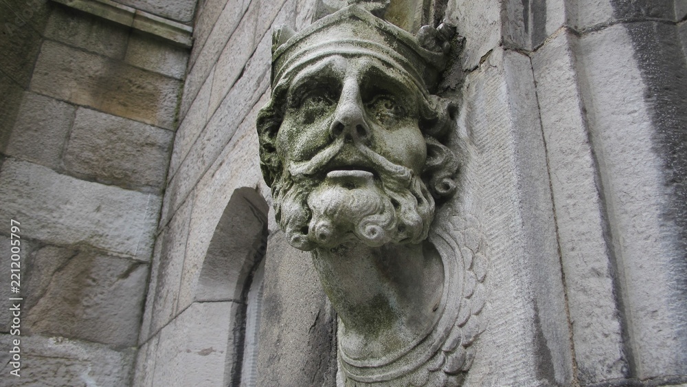 Fototapeta premium Carved stone face detail at Westminster Abbey in London