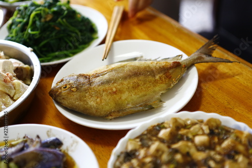 Delicious pan-fried fish in a traditional Chinese meal.