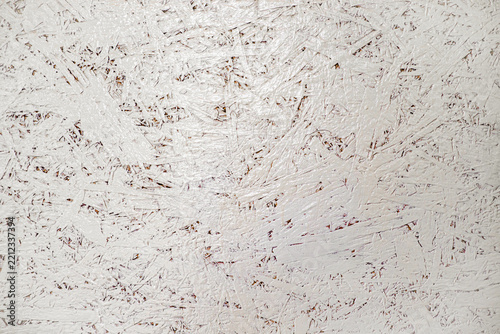 Texture background of painted white OSB oriented strand board wood panel