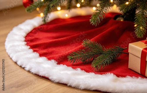 Close-Up Red Christmas Tree Skirt, White Trim Pine Needles Warm Light