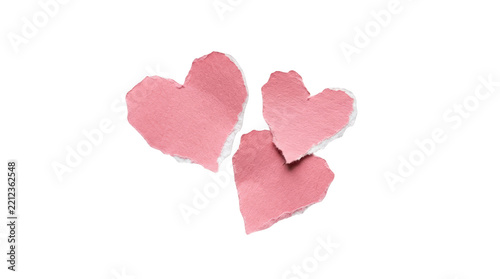 Three torn pink paper hearts isolated on transparent background