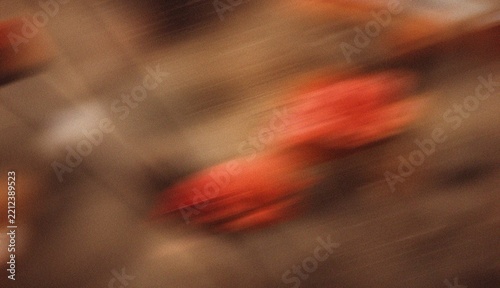 Abstract Blurred Orange Red and Brown Motion with Dynamic Streaks and Warm Autumn Colors