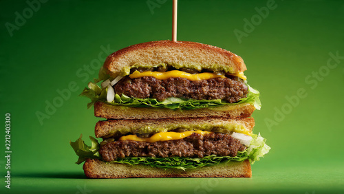 Double cheeseburger with visible ingredient layers for restaurant promotions, advertising and premium menu designs.