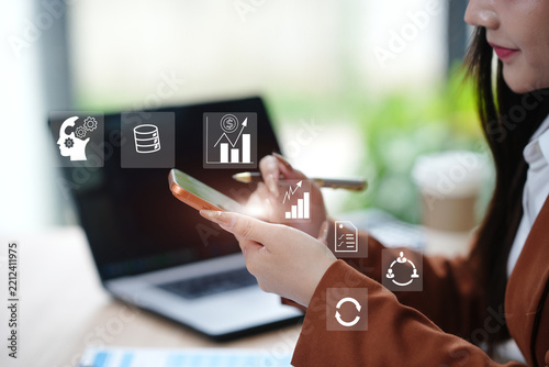 Businesswoman Using Smartphone for Data Analysis and Business Growth Concepts