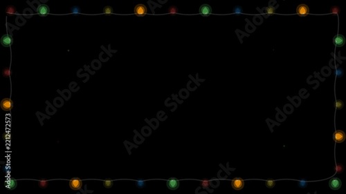 Christmas lights border colorful festive string bulb frame on black background with ample copy space