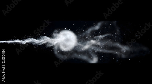 Sparkling white dust particles stream on dark black background for festive holiday celebration.