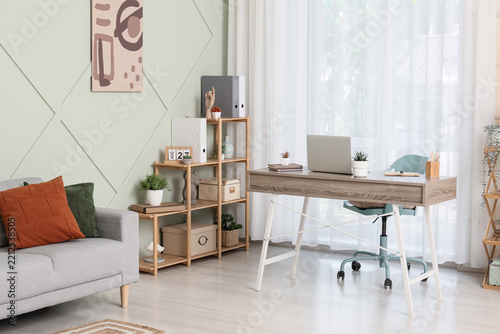 Remote work and home office setup, modern workspace with laptop and desk for ...