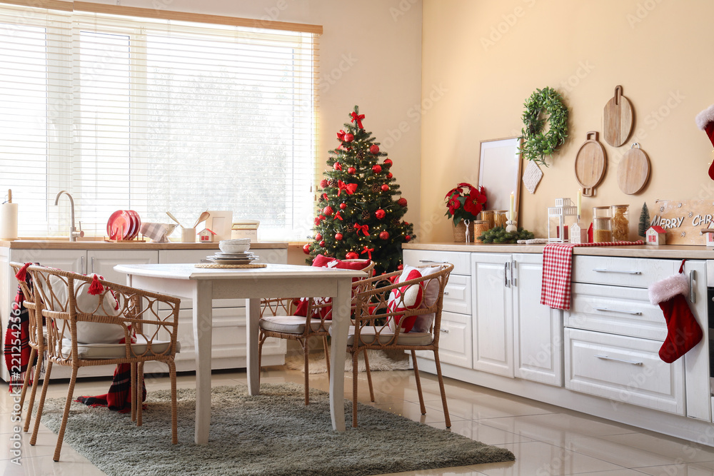 Fototapeta premium Christmas home interior, festive kitchen decoration with decorated tree and holiday spirit for family celebration and winter seasonal home comfort