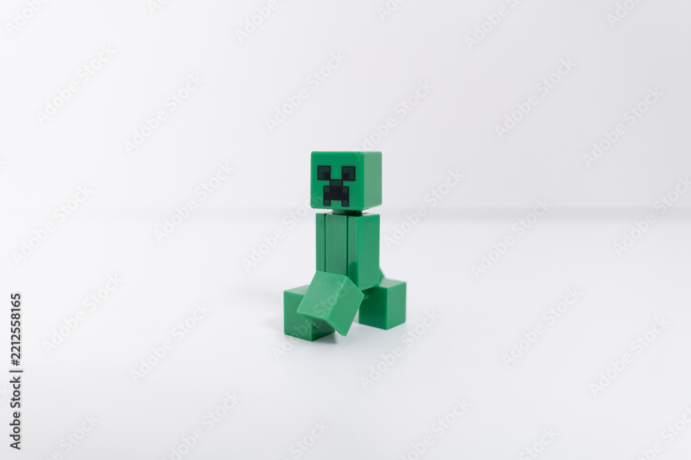 Naklejka premium Lego minecraft creeper mini-figure shot isolated on a white background. Bradford, UK Oct 2 2026