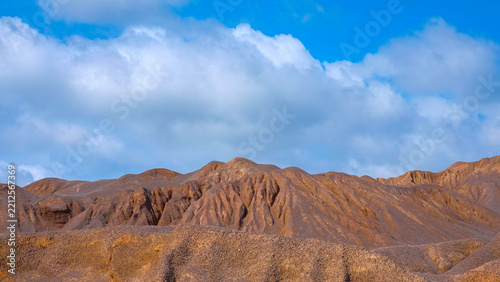 Rocky mountains, sky, and clouds.