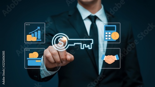 Businessman touching glowing key with dollar sign representing financial success during a business meeting