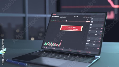 Opening laptop, screen loading trade view at night with notebooks market alert showing after drop