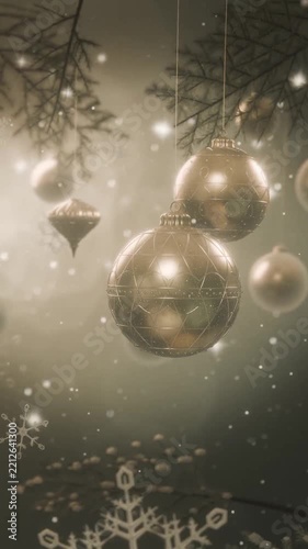 Vertical video: Pulling back revealing gold baubles swaying on pine at festive scene with snow