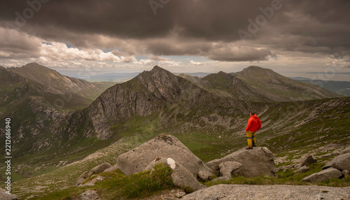 Climber taking in view of Isle of Arran Mountain Landscape.