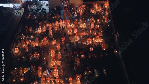 Aerial view of the cemetery in Arocutin illuminated by hundreds of candles during the Day of the Dead celebration in Arocutin, Michoacan, Mexico.