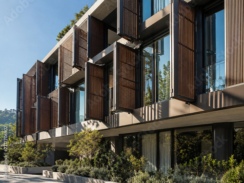 Modern facade with operable timber sunscreen panels