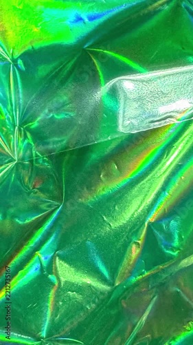 Green holographic foil texture background