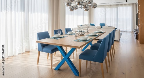Modern Dining Room with Blue Upholstered Chairs and Wooden Table in Bright Contemporary Apartment Interior