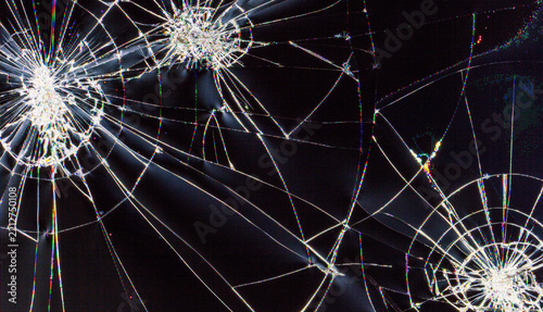 damage to the pixel grid and cracks on a broken monitor or TV screen