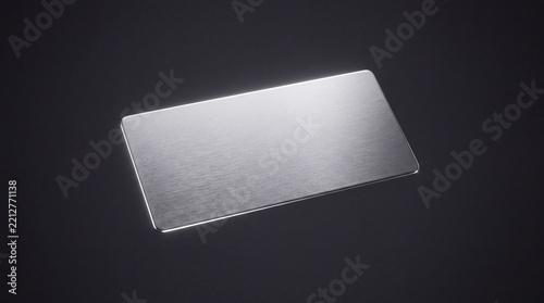 A blank brushed metal card mockup isolated on a dark background, featuring a sleek and modern design with realistic reflections.