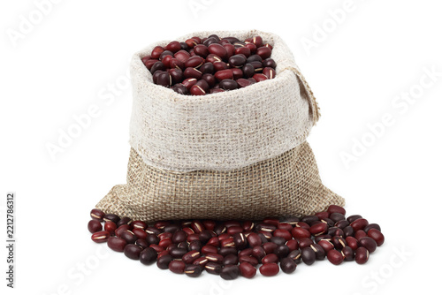 Red beans in a jute sack. isolated on white background.