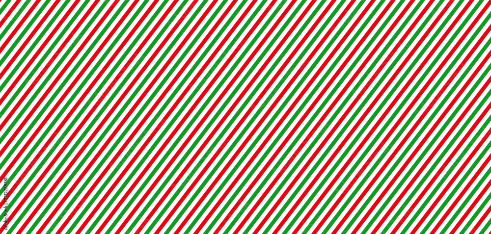 Fototapeta premium Christmas red, green and white diagonal stripes seamless pattern. Festive candy cane wrapping paper texture. Geometric vector background.