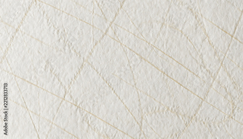 Aged off white paper texture with diagonal scratched lines