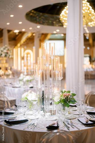 Elegant wedding reception table with candle centerpiece