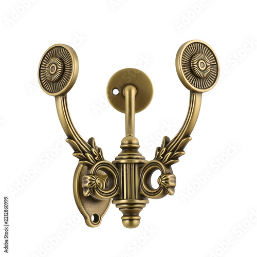 Vintage brass wall hook with ornate decorative metal scrollwork design