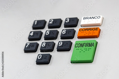 Close-up of Brazilian electronic voting machine (urna eletronica) keypad with braille buttons