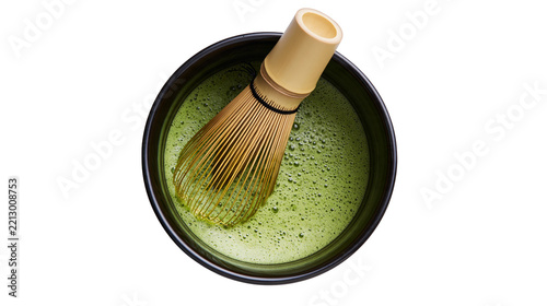 Isolated traditional Japanese matcha green tea bowl with bamboo whisk, healthy beverage