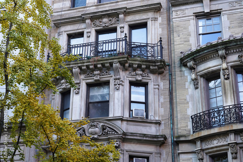 Old New York City apartment building with ornate decorative stonework